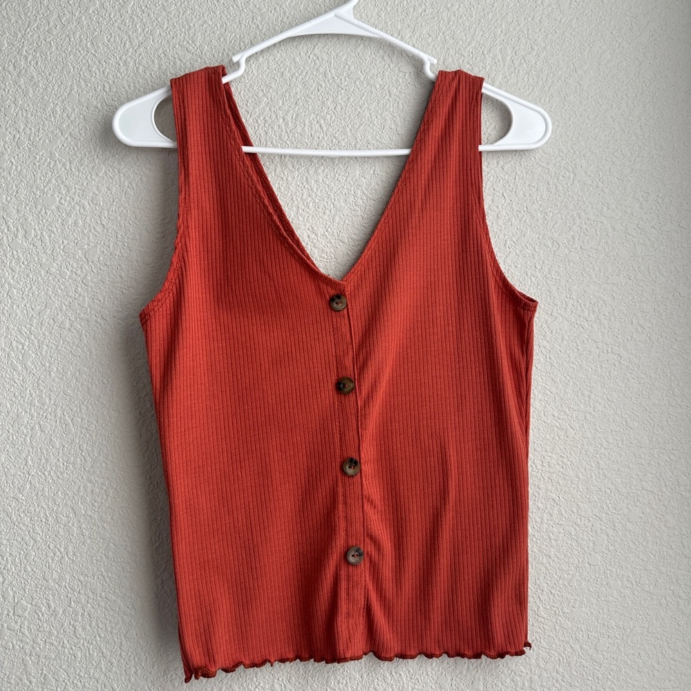 CAUTION TO THE WIND ORANGE TANK TOP